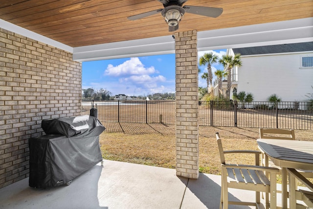 view of patio featuring ceiling fan and grilling area