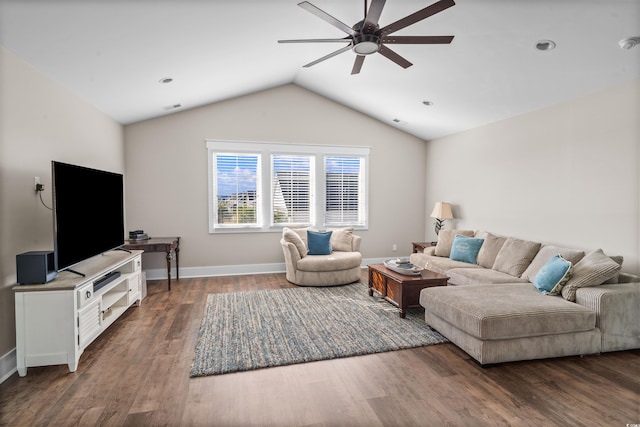 living room featuring lofted ceiling, ceiling fan, and dark wood-type flooring