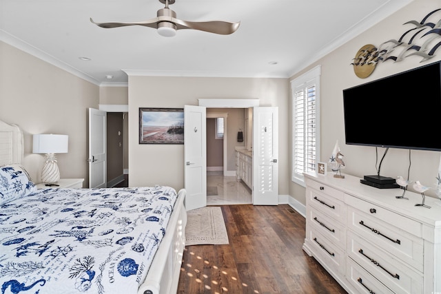 bedroom featuring ceiling fan, dark hardwood / wood-style flooring, ornamental molding, and ensuite bath