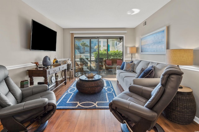 living room with hardwood / wood-style flooring