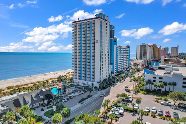 aerial view with a view of the beach and a water view