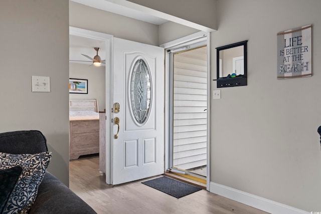 entryway featuring ceiling fan and light hardwood / wood-style flooring