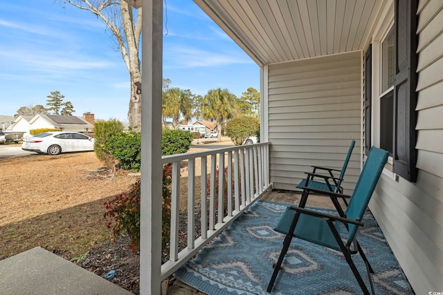 balcony featuring covered porch