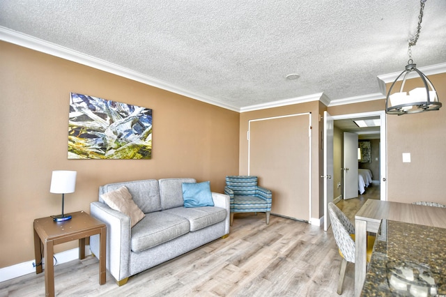 living room with crown molding and hardwood / wood-style flooring