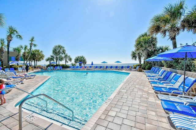 pool with a patio