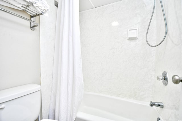 bathroom with toilet and shower / bath combination with curtain