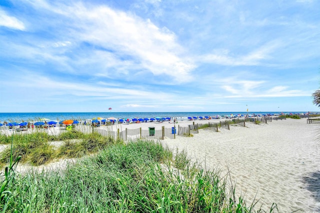 property view of water featuring a beach view