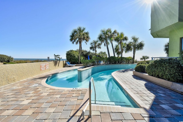 view of swimming pool featuring a patio