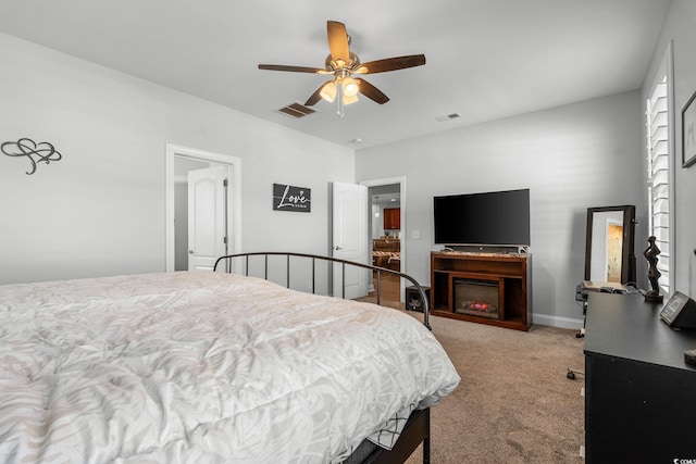 bedroom featuring ceiling fan and carpet floors