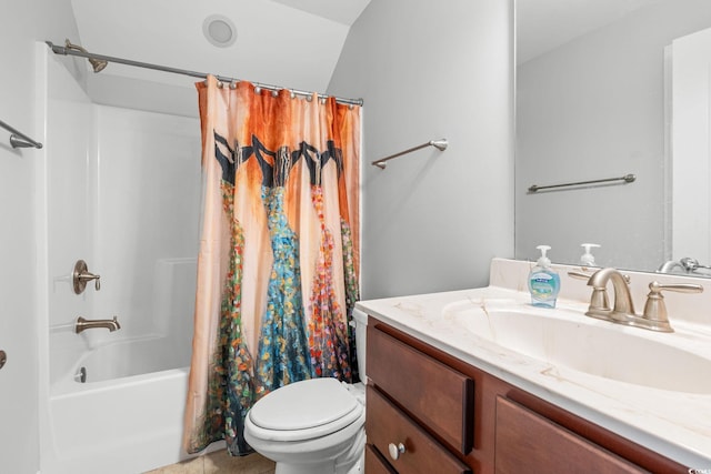 full bathroom featuring tile patterned flooring, vanity, shower / bath combo with shower curtain, and toilet