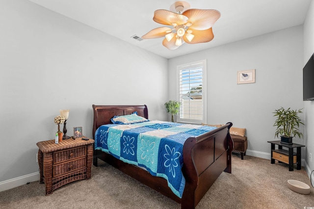 bedroom featuring ceiling fan and carpet