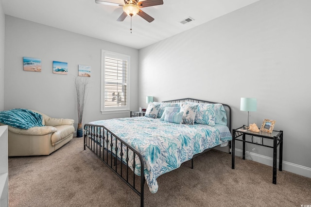 bedroom with ceiling fan and carpet