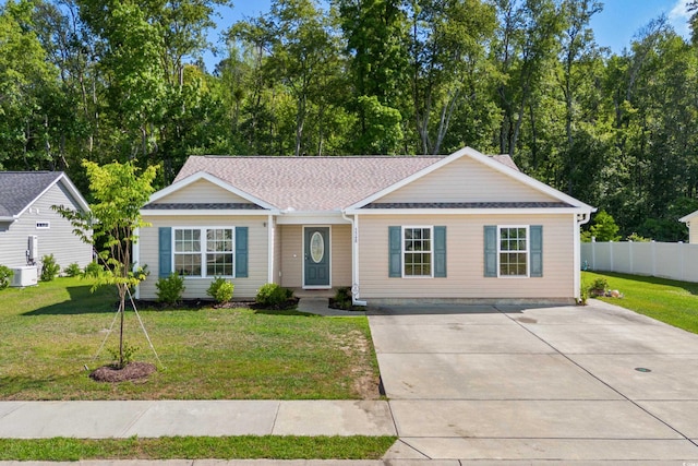 ranch-style home with a front yard