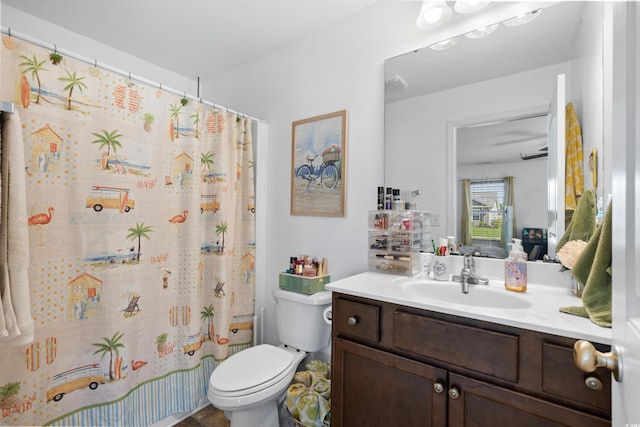 full bathroom featuring vanity, toilet, and shower / tub combo