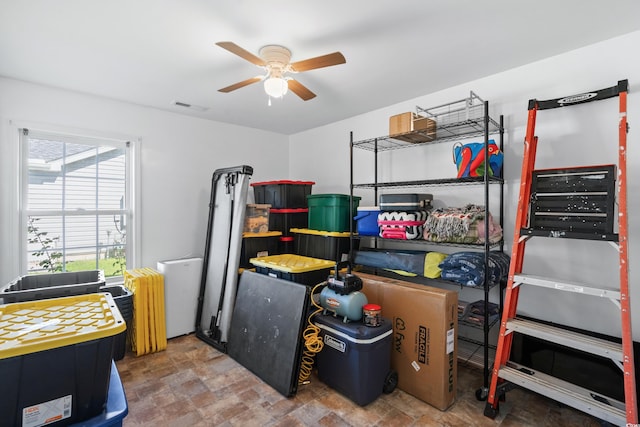 storage featuring ceiling fan