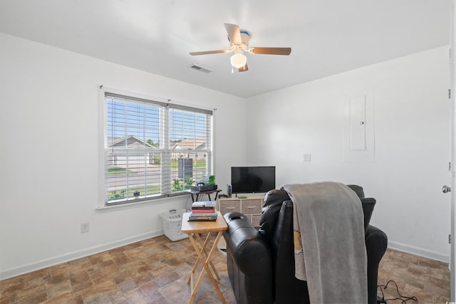 living room with ceiling fan