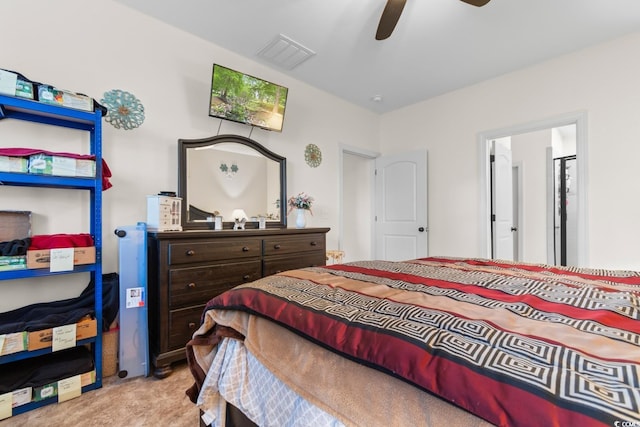 bedroom featuring ceiling fan and light colored carpet