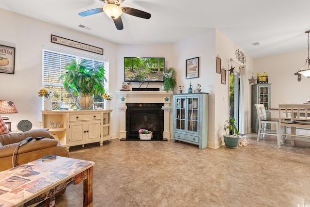 living room with ceiling fan