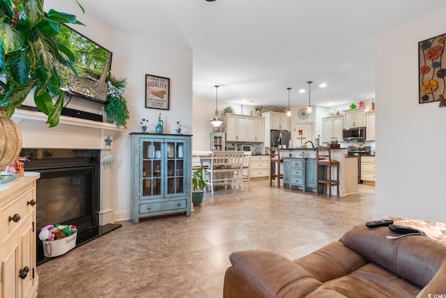 living room featuring a fireplace