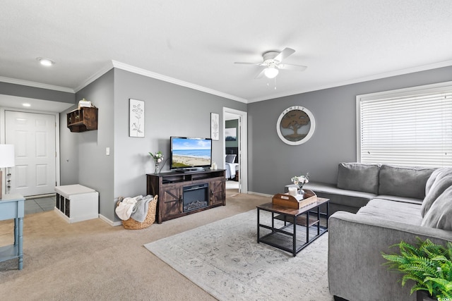 carpeted living room featuring ceiling fan and ornamental molding