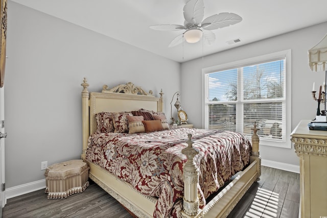 bedroom featuring hardwood / wood-style flooring and ceiling fan