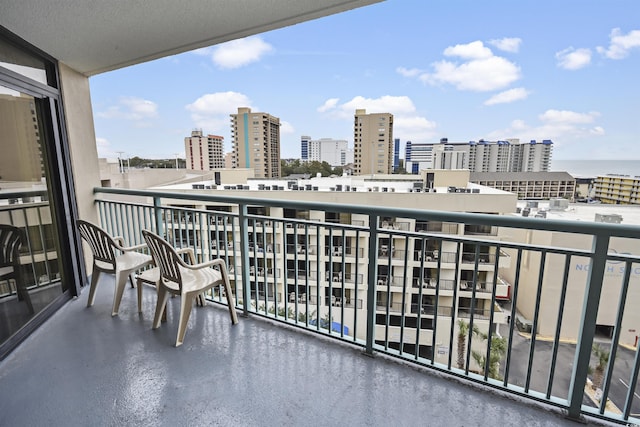 balcony featuring a water view