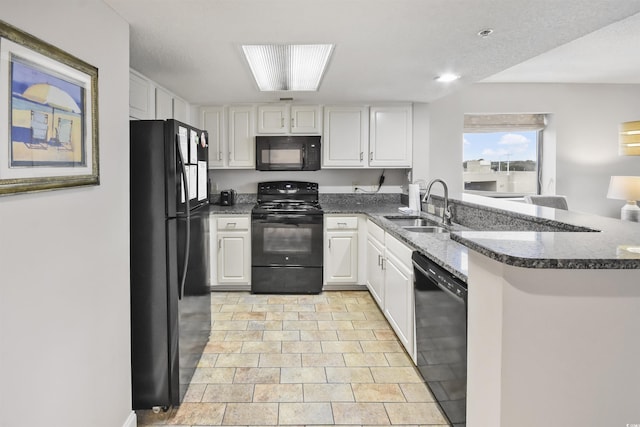 kitchen with kitchen peninsula, sink, white cabinets, and black appliances