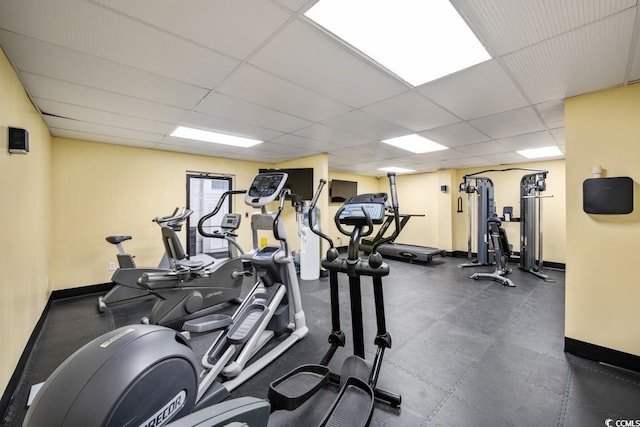 gym with a drop ceiling