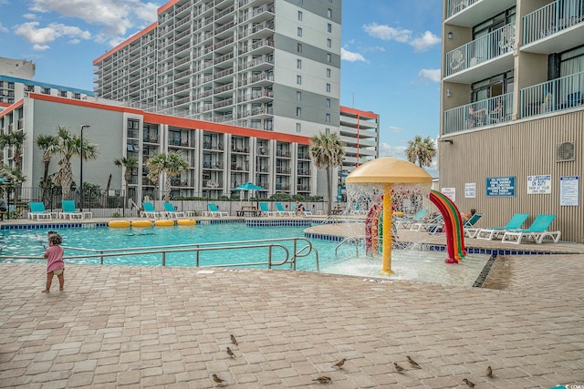 view of pool featuring pool water feature