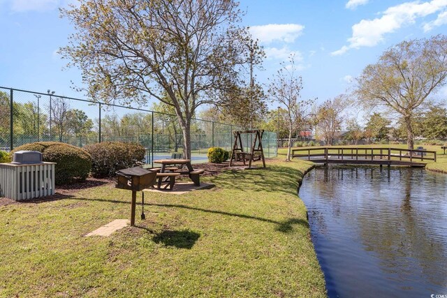 5905 S Kings Hwy Unit 908C, Myrtle Beach, SC 29575 - view of property's community featuring a lawn and a water view