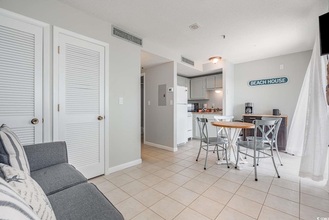 5905 S Kings Hwy Unit 908C, Myrtle Beach, SC 29575 - tiled dining area with a textured ceiling