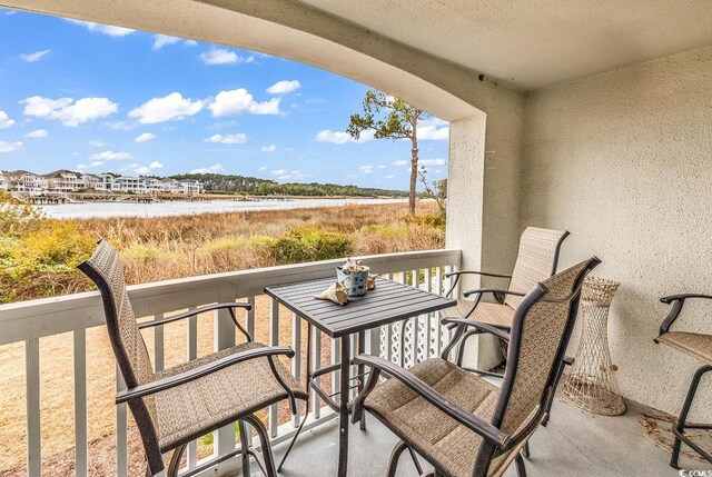 4560 Greenbriar Dr Unit 102-B, Little River, SC 29566 - balcony with a water view