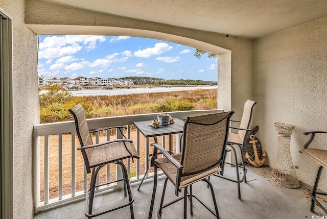 4560 Greenbriar Dr Unit 102-B, Little River, SC 29566 - balcony featuring a water view