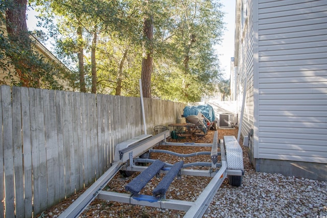 view of yard featuring central AC unit