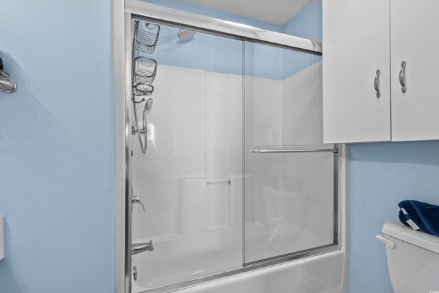 618 3rd Ave S Unit 4D, North Myrtle Beach, SC 29582 - bathroom with shower / bath combination with glass door and toilet