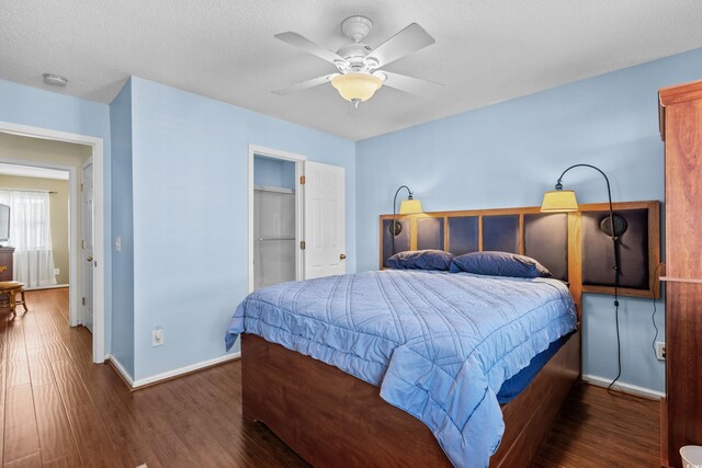 618 3rd Ave S Unit 4D, North Myrtle Beach, SC 29582 - bedroom with wood finished floors, baseboards, and a ceiling fan