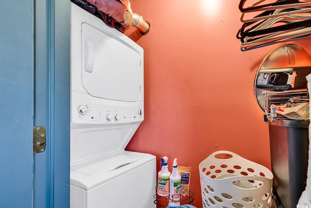laundry room featuring stacked washing maching and dryer