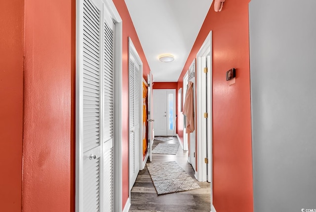 hall featuring dark wood-type flooring