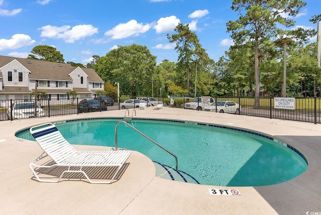 view of pool with a patio area