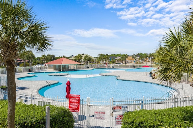 view of pool featuring a patio area