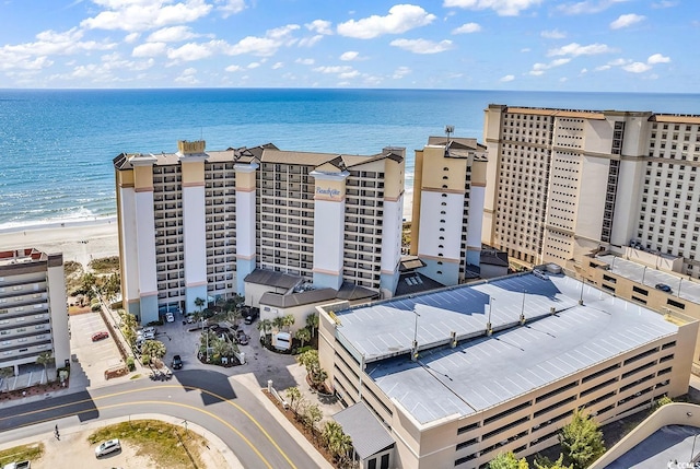 bird's eye view with a beach view and a water view