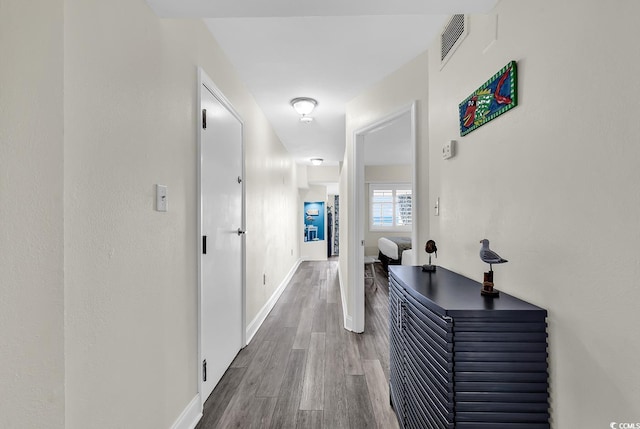 hallway featuring hardwood / wood-style flooring