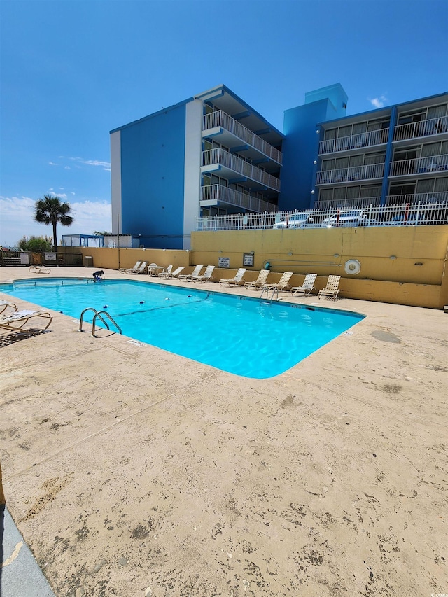 view of pool with a patio