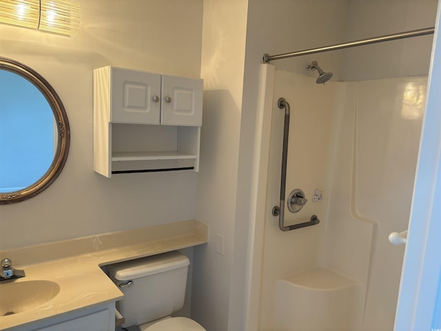 full bath with toilet, walk in shower, and vanity