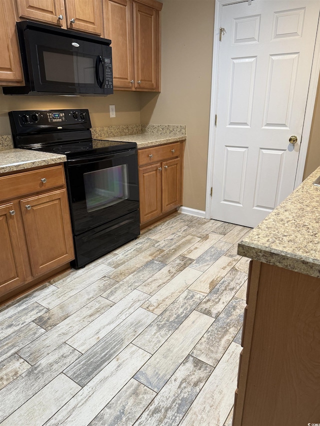 kitchen with black appliances