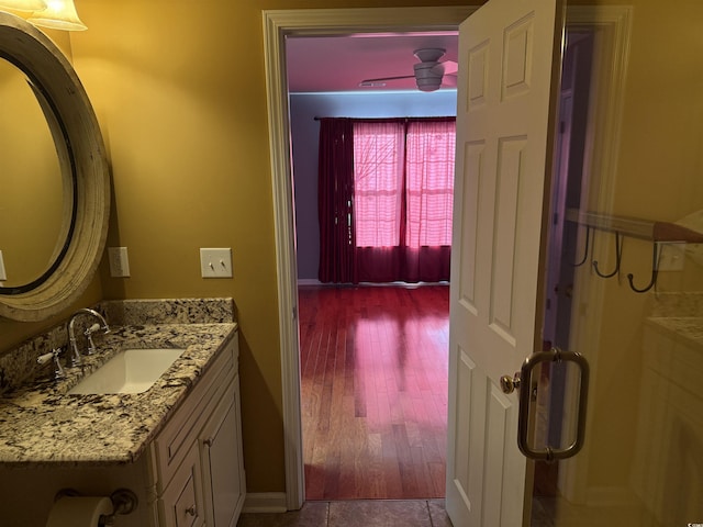 bathroom featuring tile patterned floors and vanity