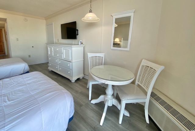 9550 Shore Dr Unit 1226, Myrtle Beach, SC 29572 - bedroom with baseboards, crown molding, and wood finished floors