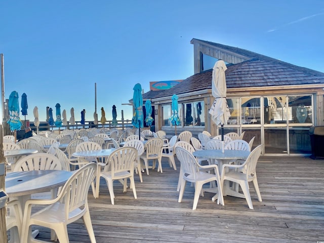 9550 Shore Dr Unit 1226, Myrtle Beach, SC 29572 - wooden terrace featuring outdoor dining area