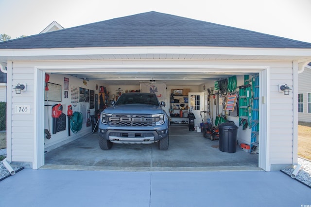 garage featuring driveway