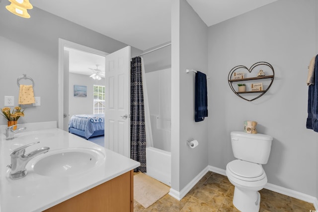 full bathroom with toilet, shower / bathtub combination with curtain, double vanity, ceiling fan, and baseboards